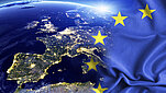 Grafika z kontynentem europejskim i flagą UE. 